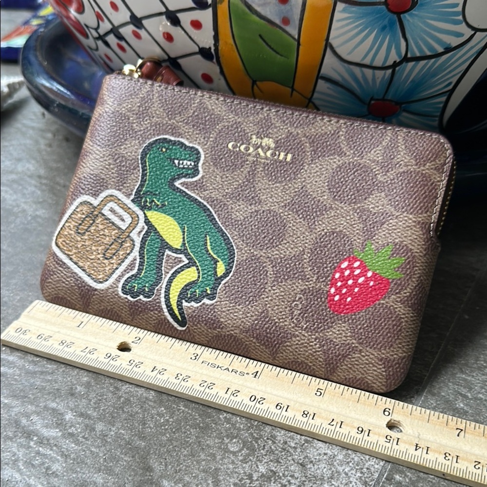 Coach Brown Wristlet with Dinosaur and Strawberry Patches - Picture 6 of 13